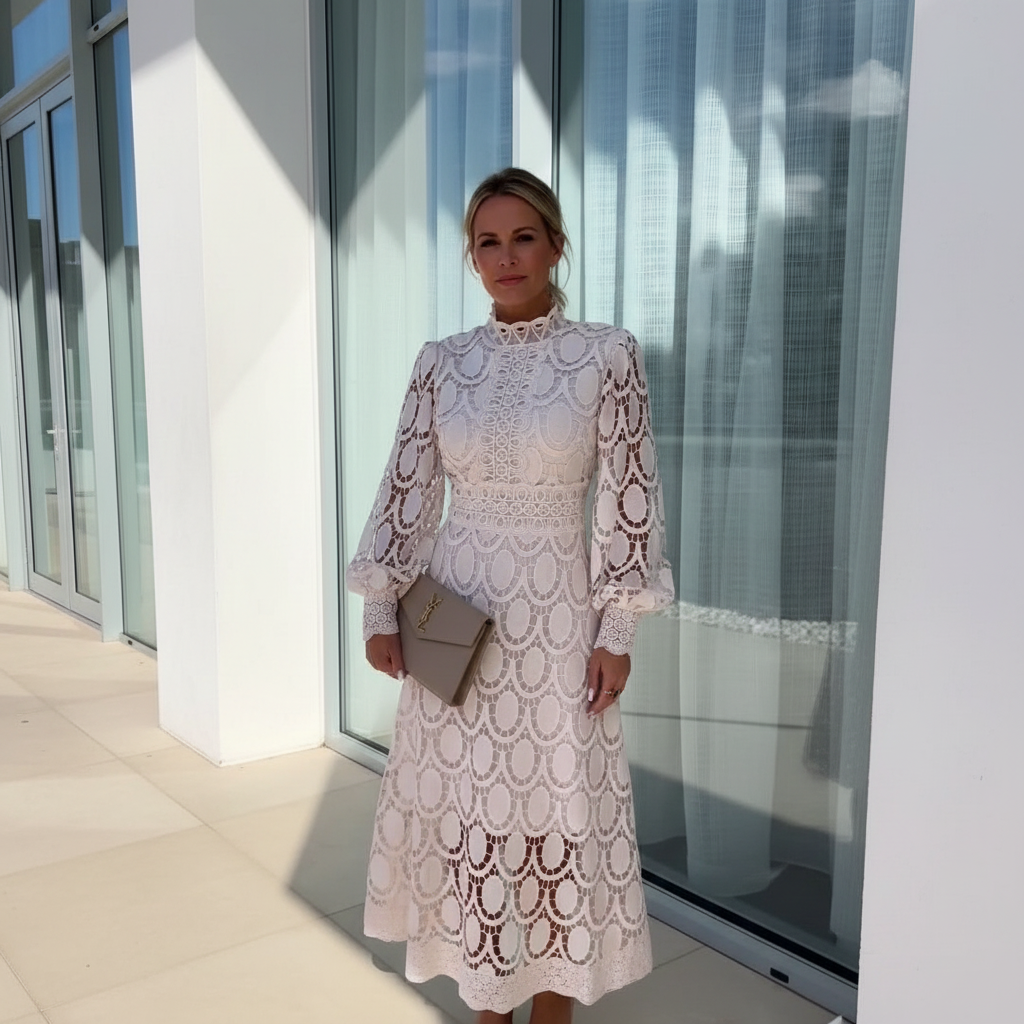 Lace fabric women’s midi dress with long sleeves and defined waist shape