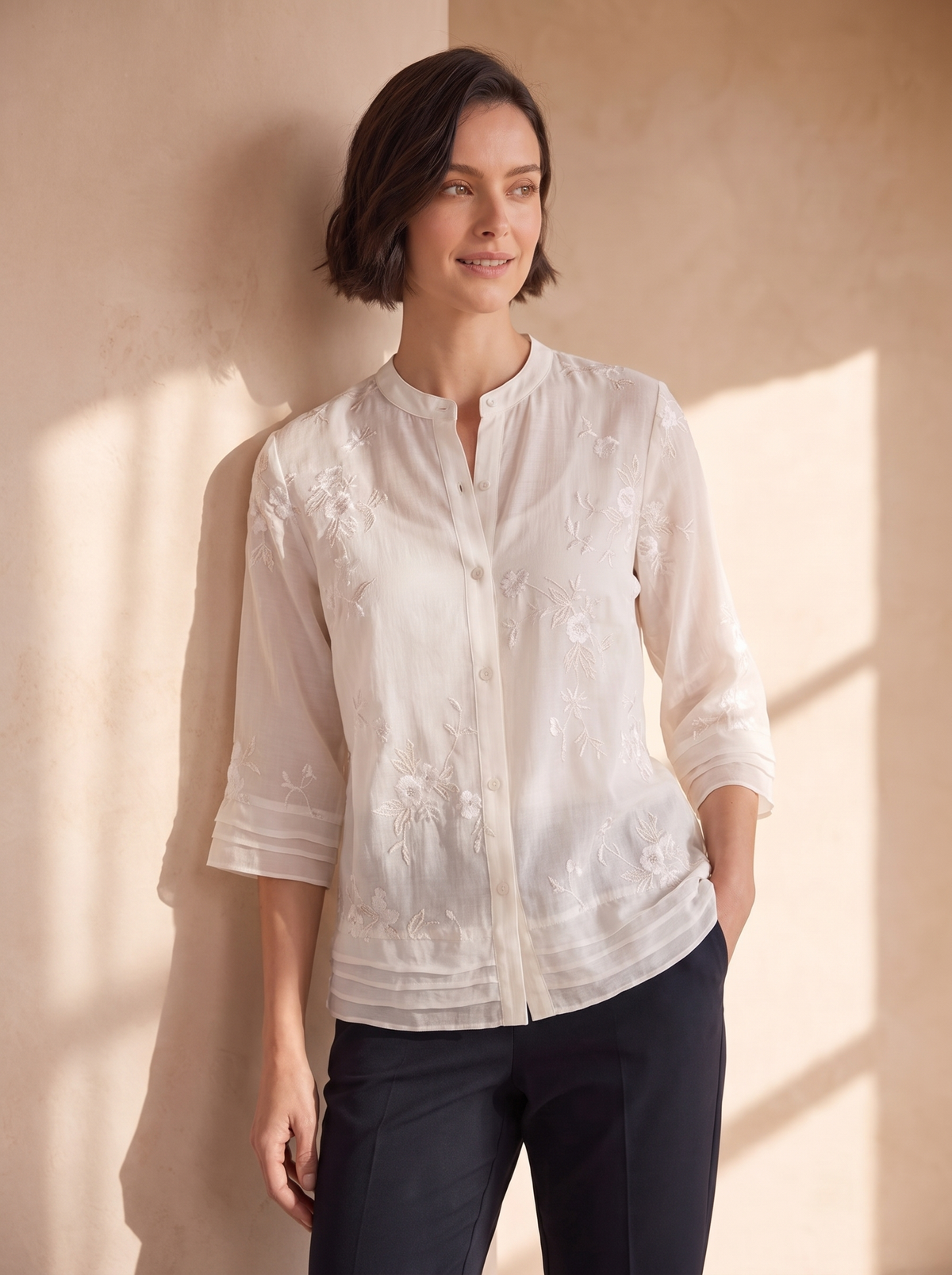 Embroidered blouse with three quarter sleeves