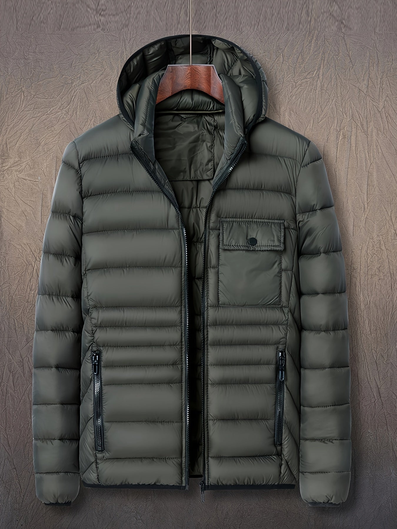 hooded puffer jacket in polyester blend showing quilted texture detail
