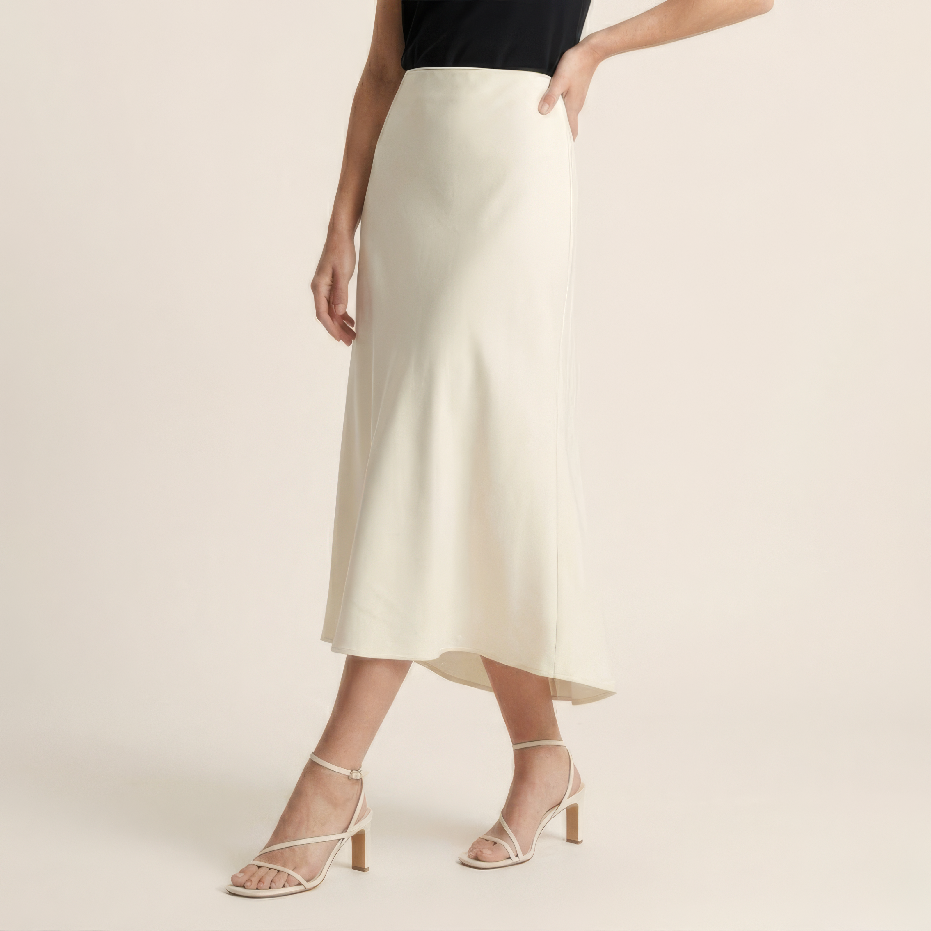 Women's satin midi skirt showcasing the front design