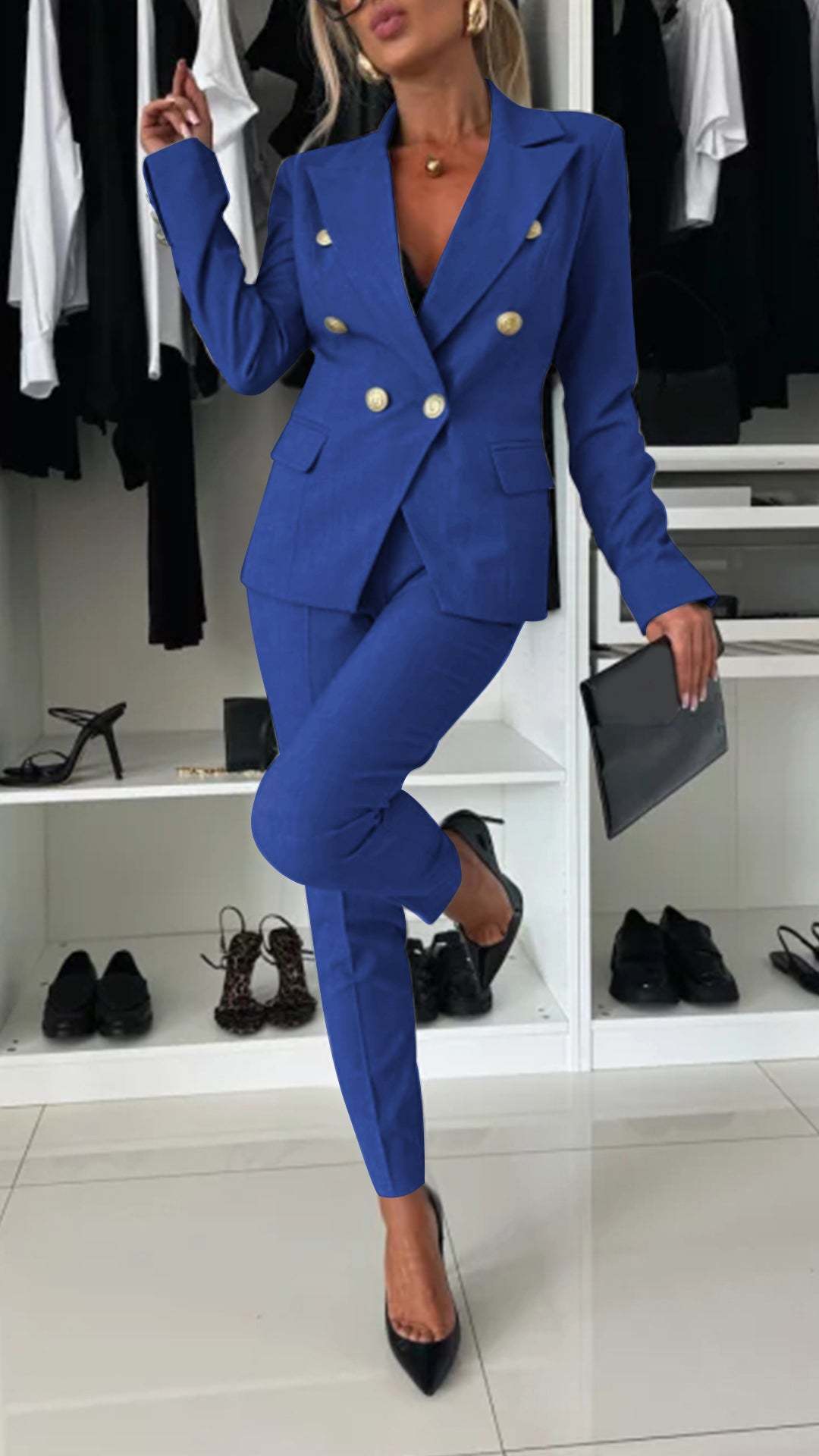 Double-breasted woven blazer with welt pockets paired with straight-leg trousers