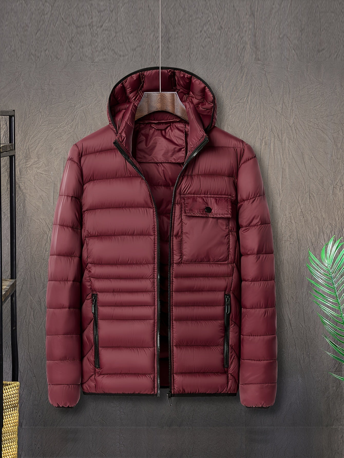 slim fit puffer jacket with hood displayed on model side angle