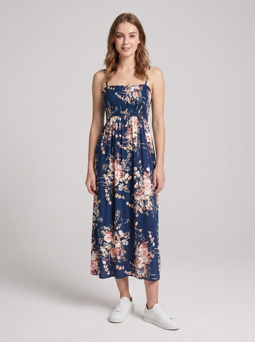 Smocked summer dress designed with tiered ruffle detailing for everyday warm-weather wear