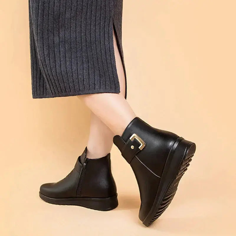 Women's boots featuring reinforced toe and heel construction