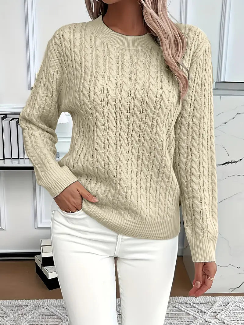 Ribbed wool jumper featuring cable-knit pattern for women
