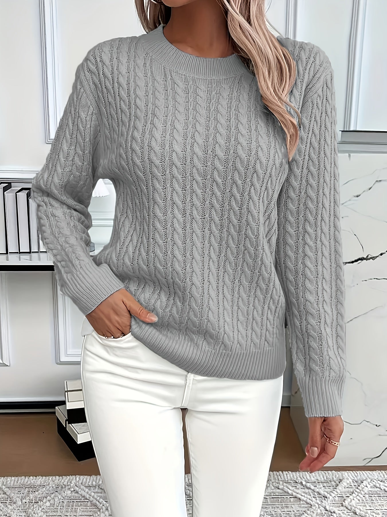 Textured wool jumper with cable-knit detail and pullover style
