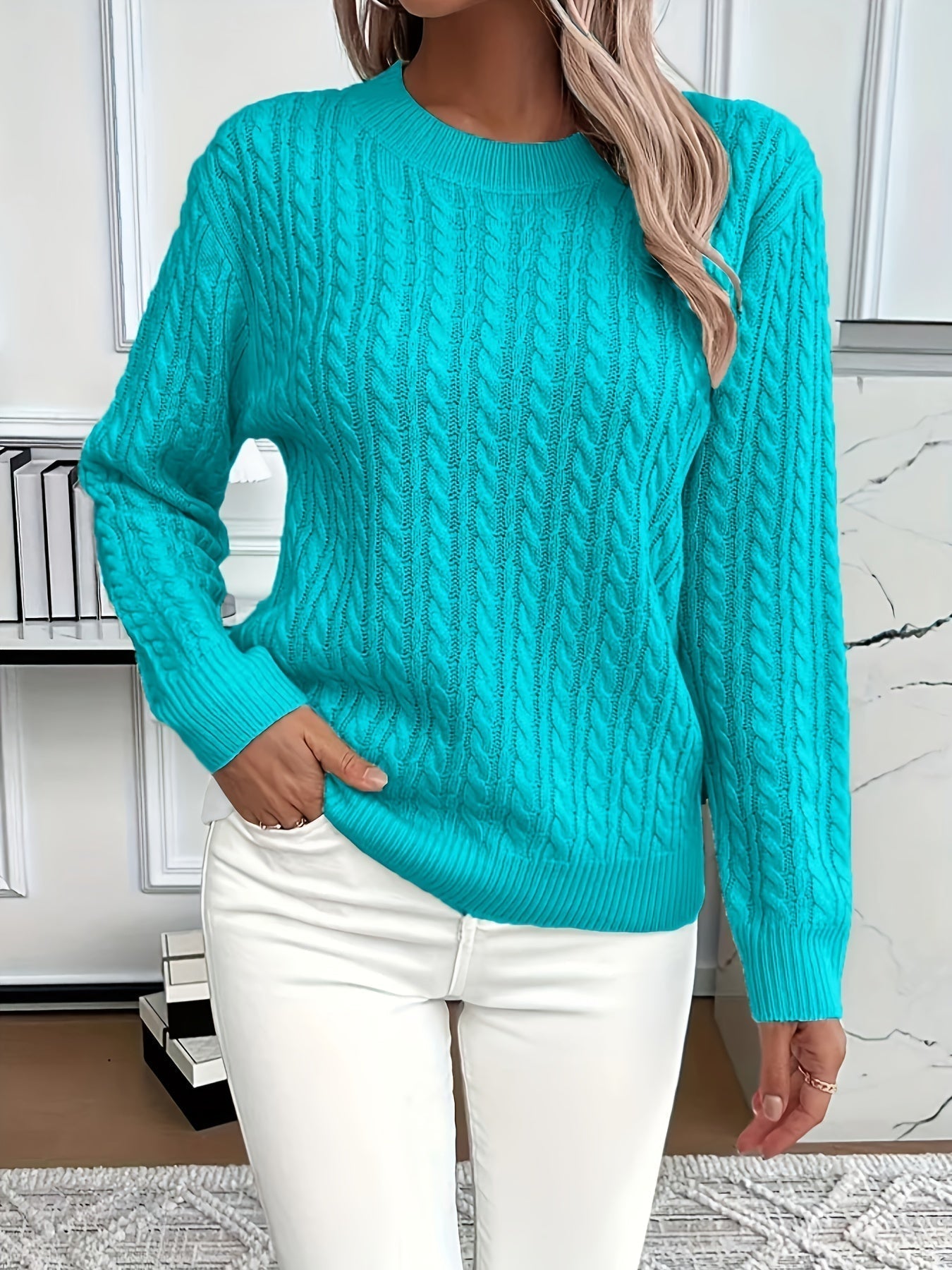Cable-knit wool jumper with ribbed cuffs and hem
