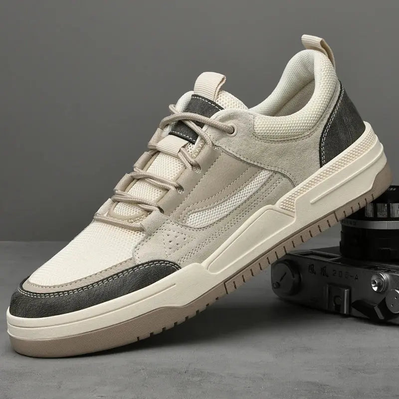 mesh suede trainers shown from side angle with lace-up closure and cushioned sole