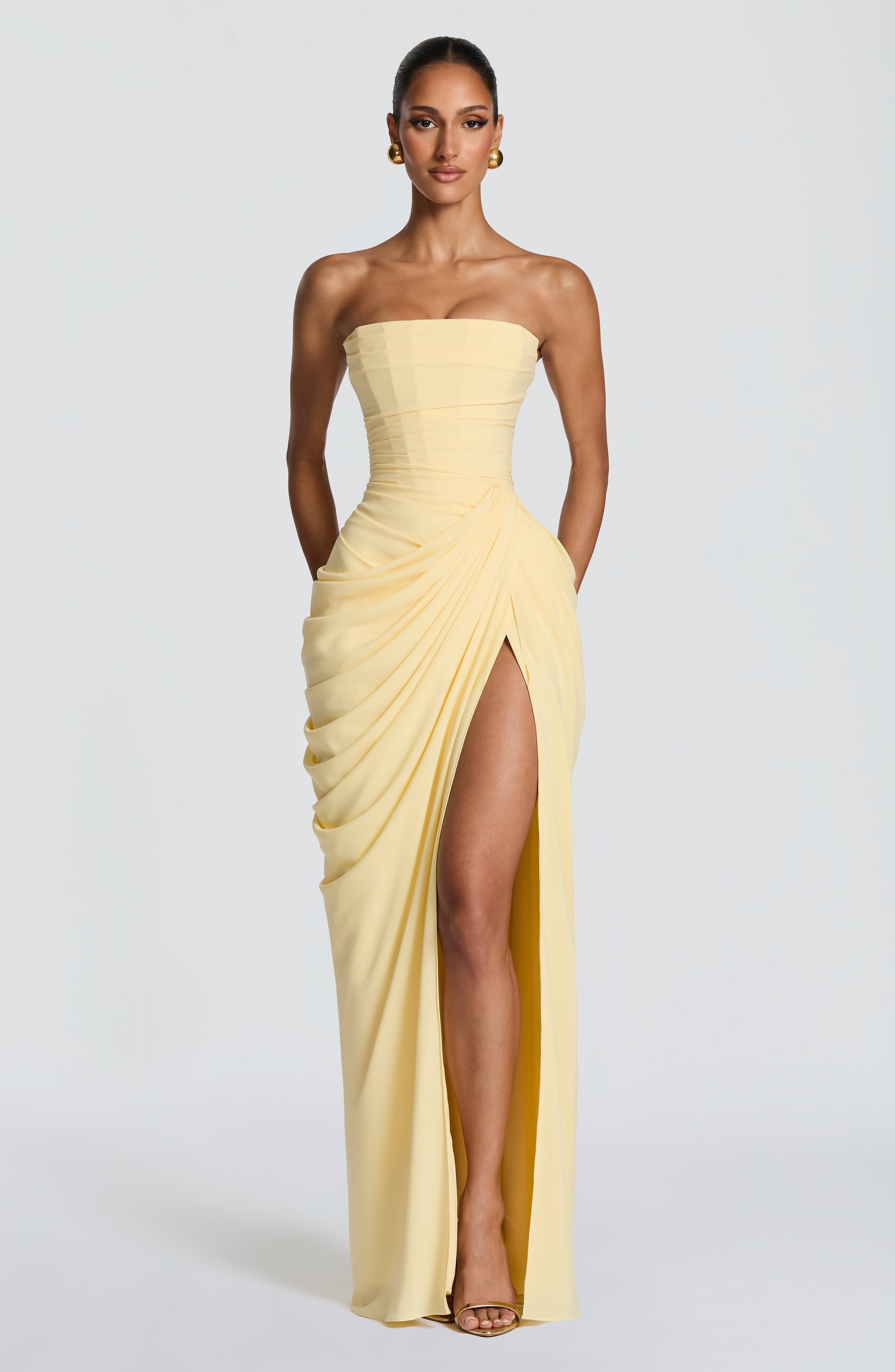 Women's yellow chiffon strapless maxi dress with fitted silhouette