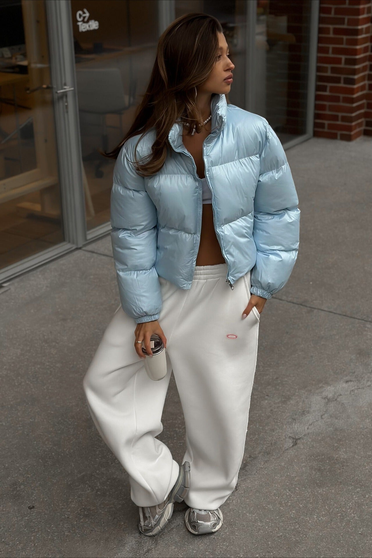 Cotton puffer jacket with ribbed cuffs and loose cut for women