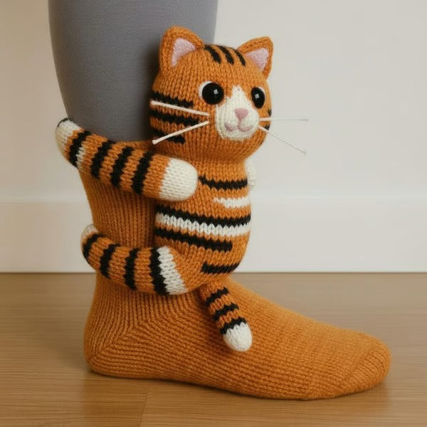 Ankle-length cotton socks featuring raised animal face detail for casual wear
