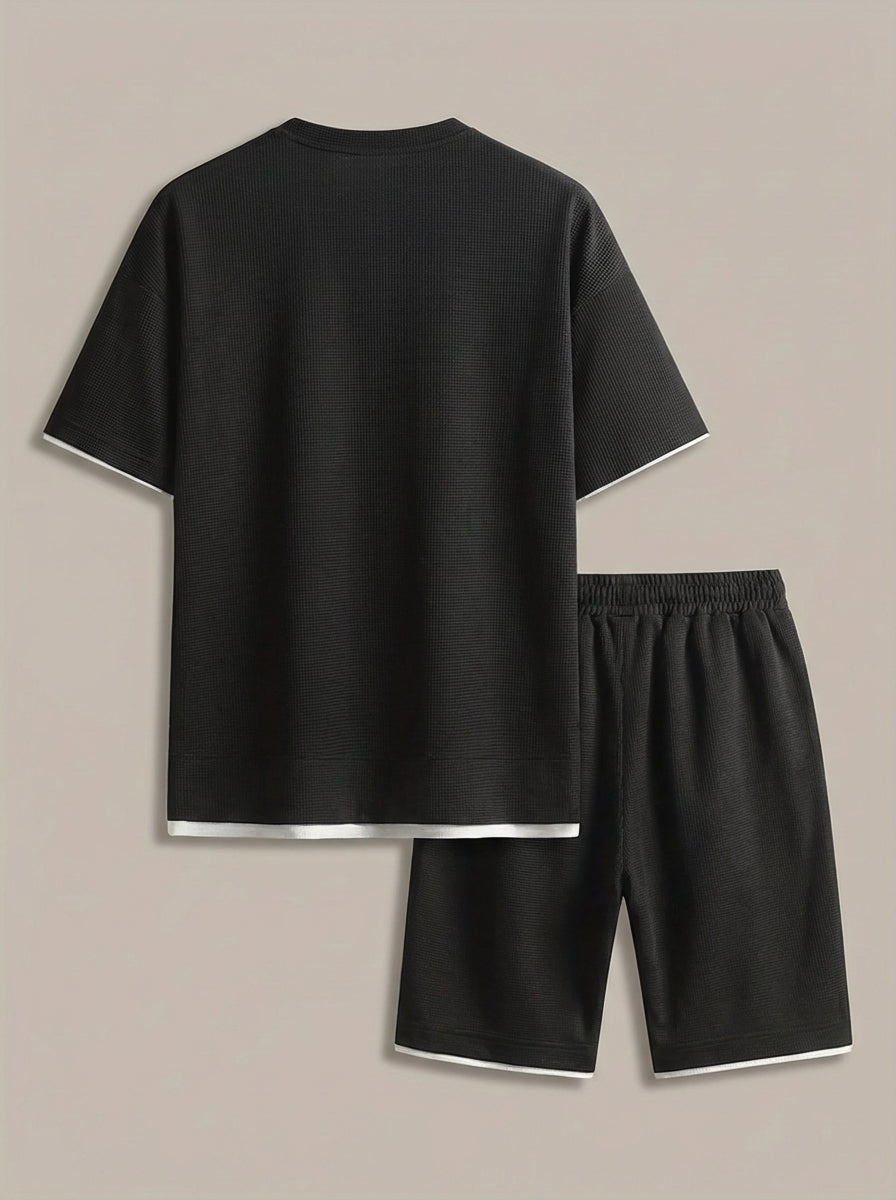 Men's slim fit two-piece set in black with short-sleeve T-shirt and matching shorts