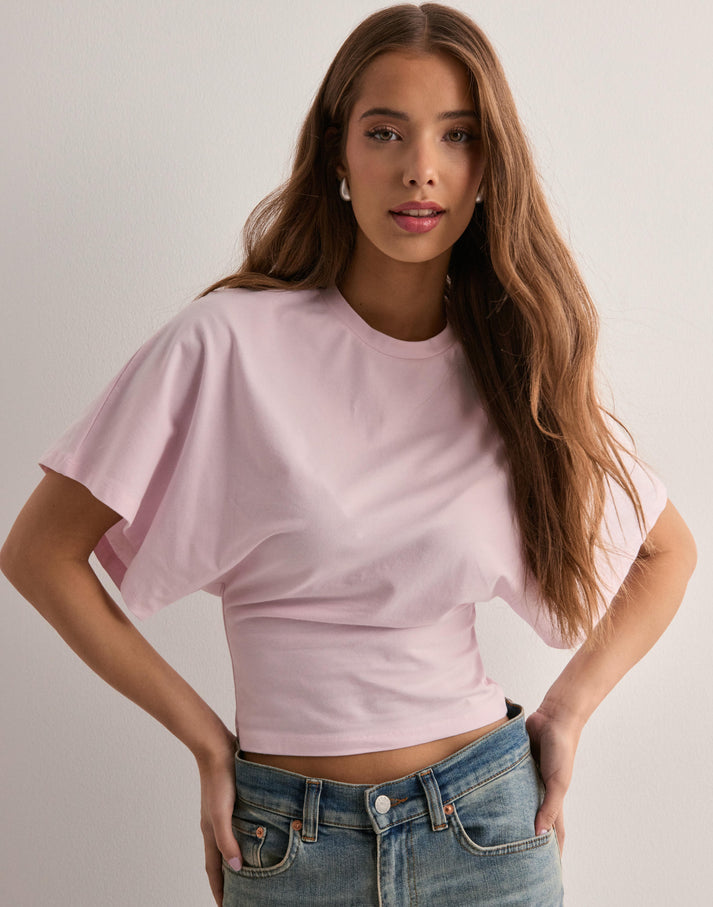 Women's relaxed fit wide sleeve graphic tee in PINK— front view