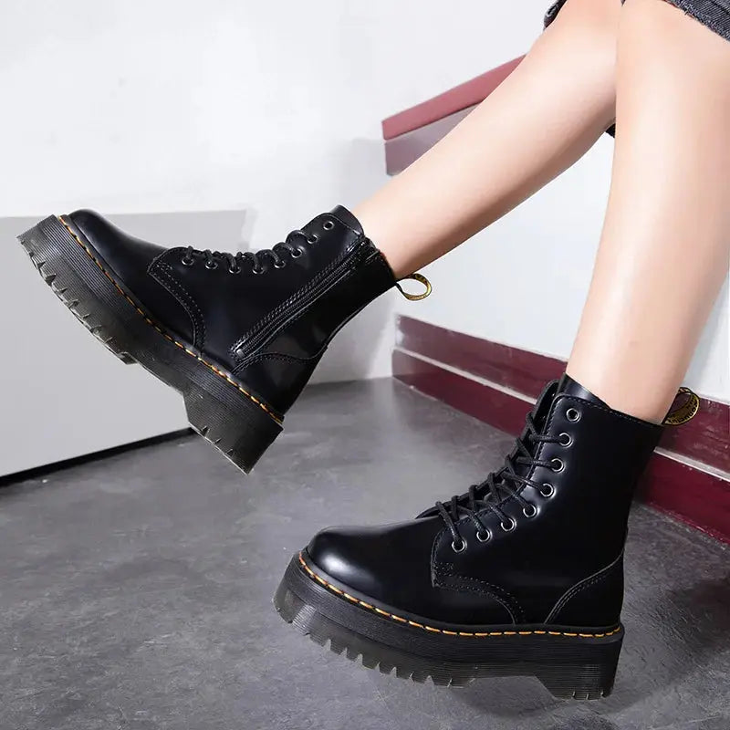 leather platform combat boots with chunky sole and lace-up front shown from side angle