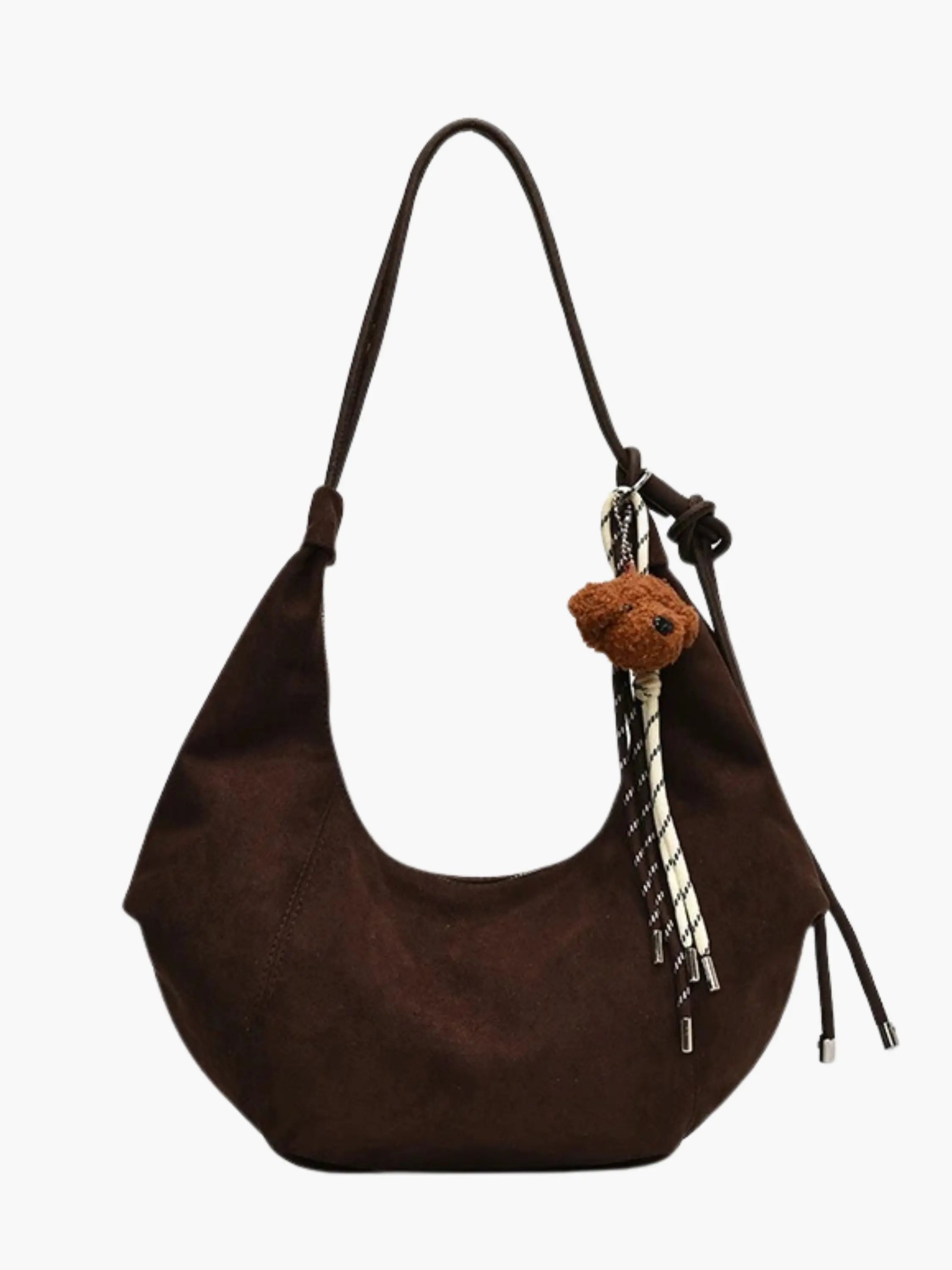 suede hobo purse with open shoulder strap shown from front angle
