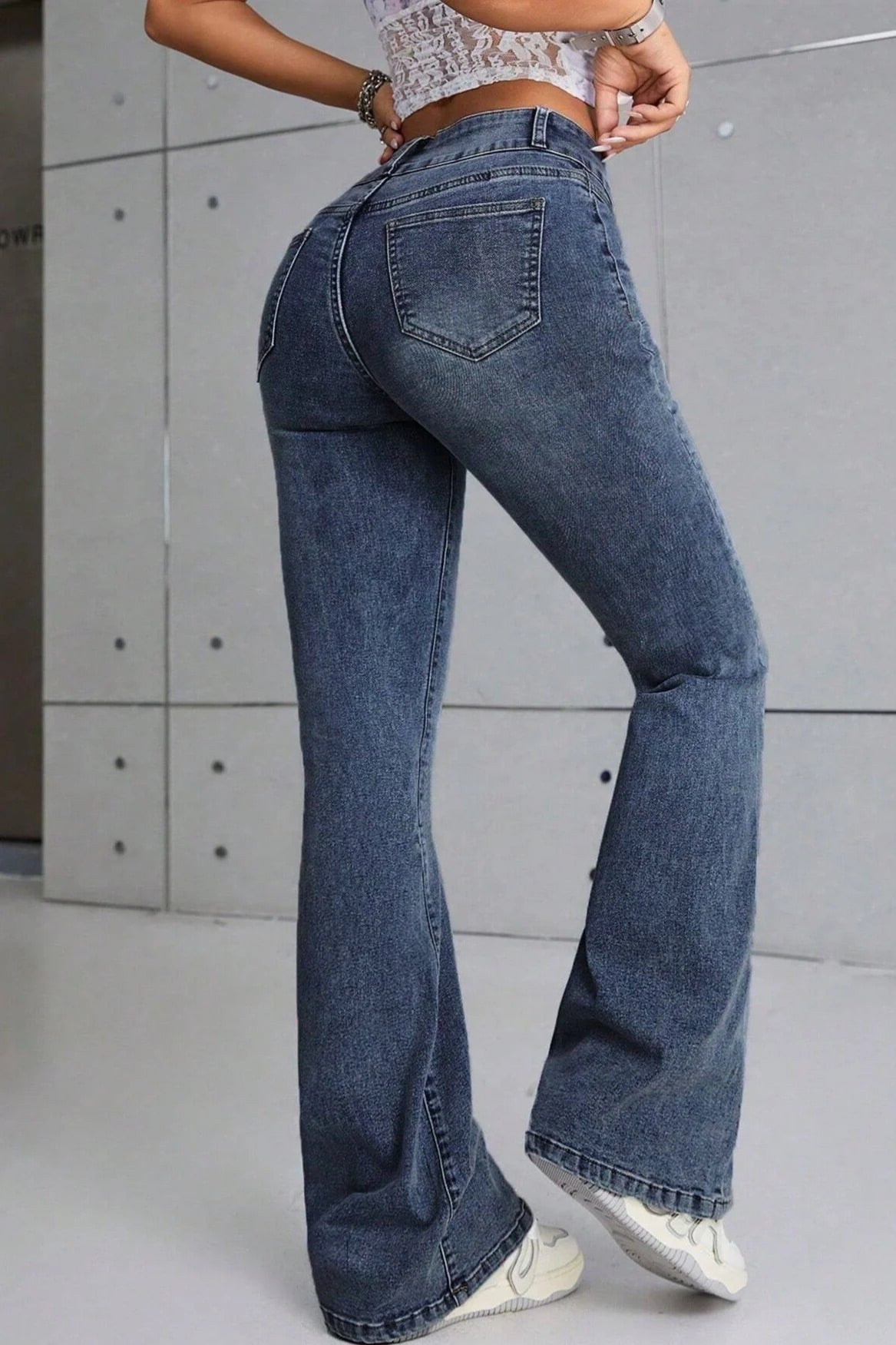 Stretch denim jeans reverse angle flared hem slim fit for women
