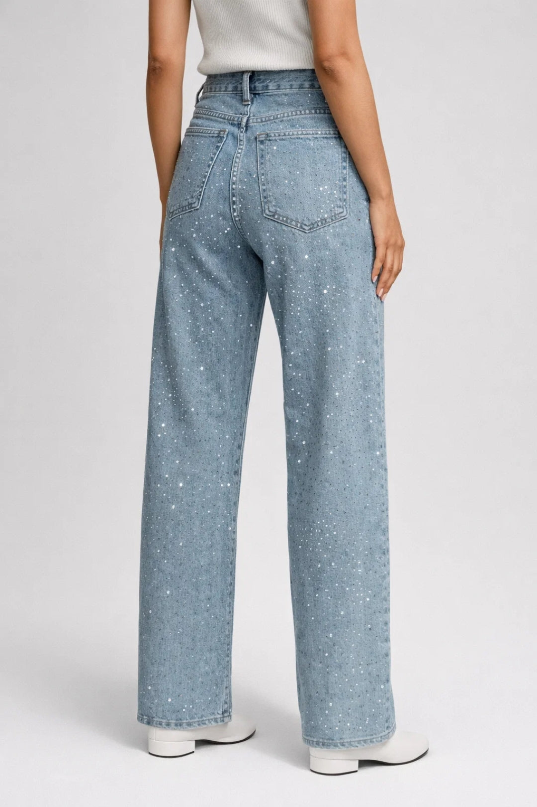 Women's straight leg denim jeans with button and zip fastening