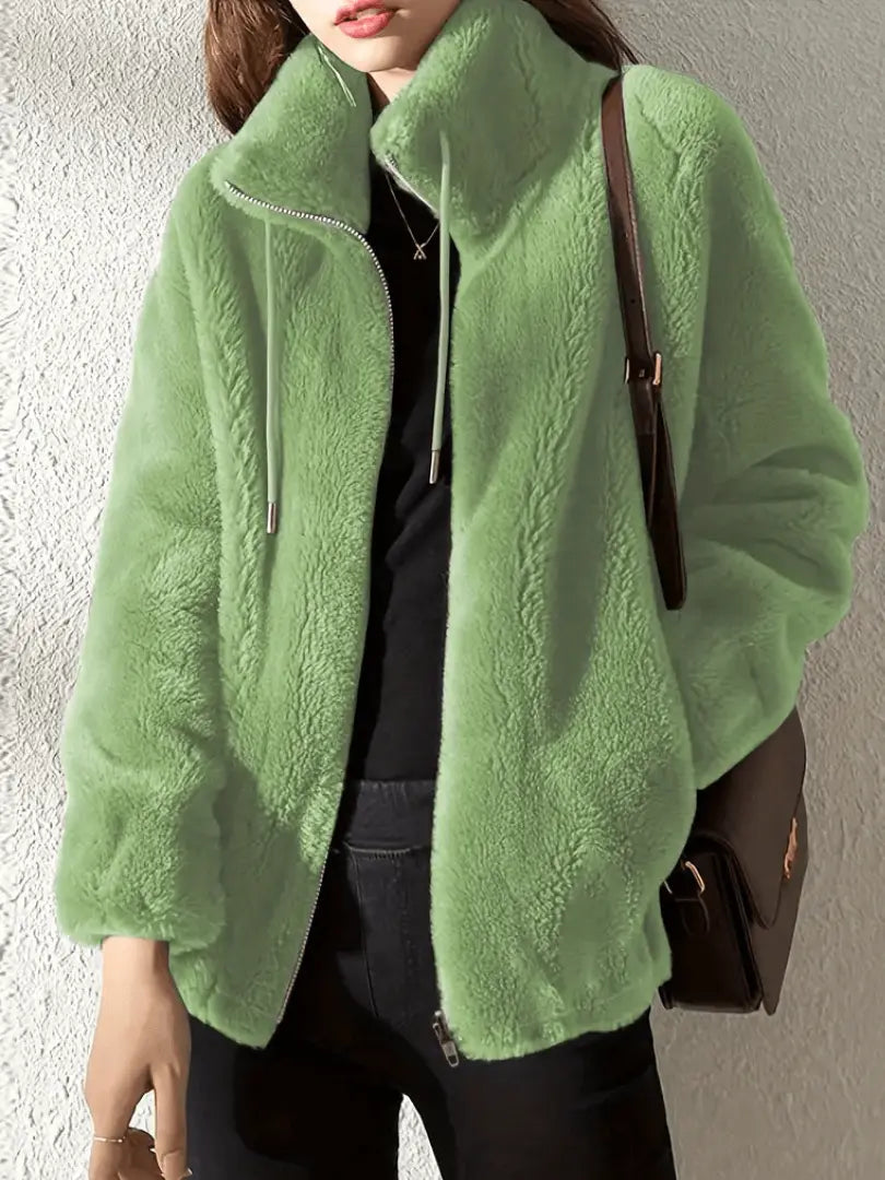 high neck fleece outerwear with clean lines displayed on figure