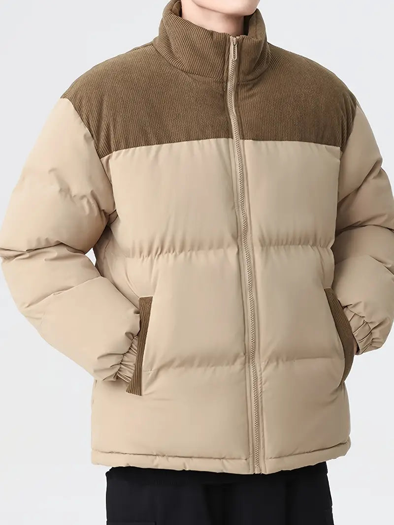 corduroy panel puffer jacket with quilted design shown from front angle on plain background