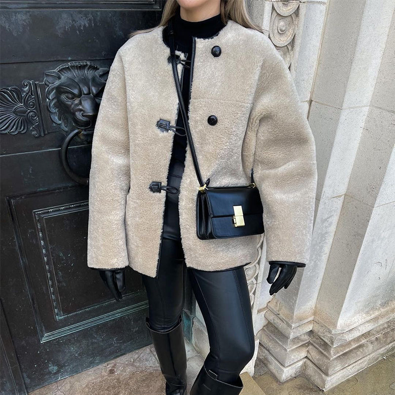 Faux fur coat with generous fit
