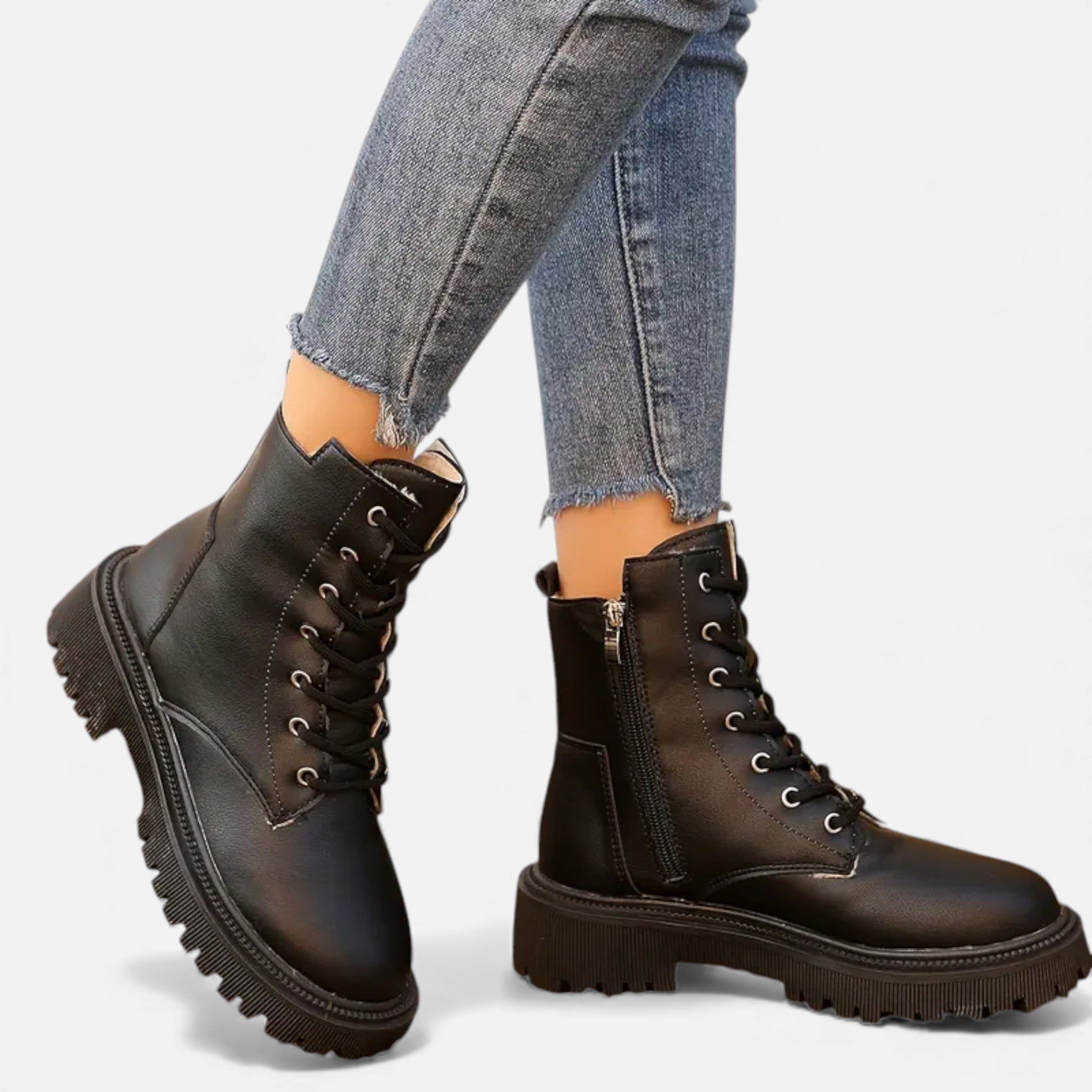 Women's black PU leather lace-up ankle boots – front view showing lace-up closure and ankle-height silhouette
