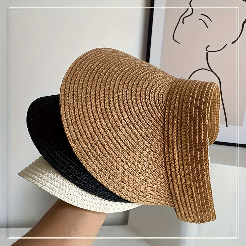 Women's wide brim visor hat worn outdoors, lightweight sun protection