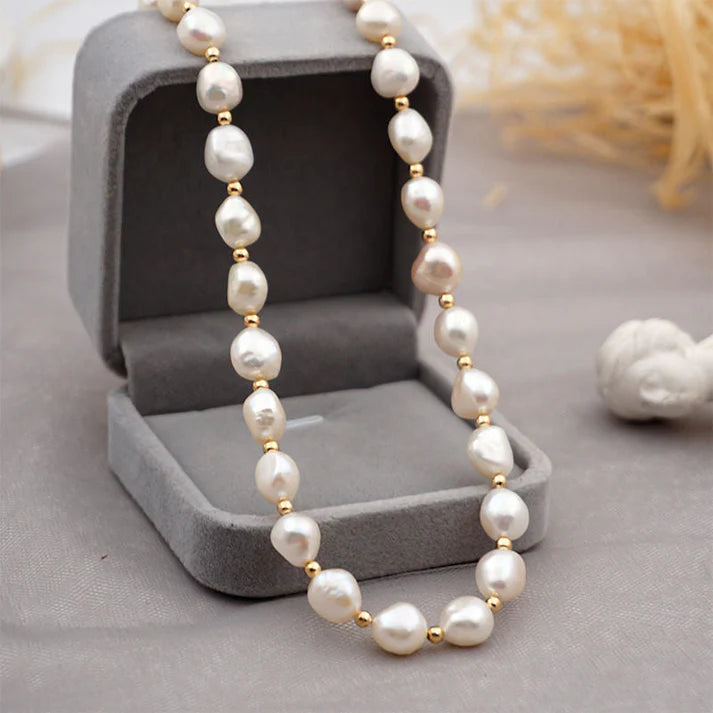 Women's freshwater pearl pendant necklace styled as a wearable accessory