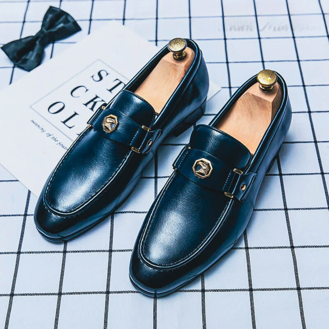 Men's blue slip-on loafers with low-top profile and PU upper, shown in a casual style