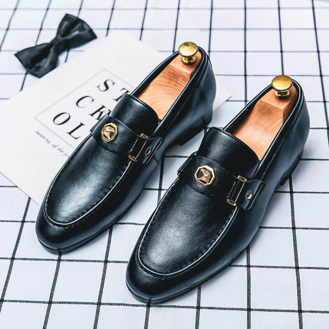 Men's black slip-on loafers with closed-toe design and PU construction, casual everyday wear