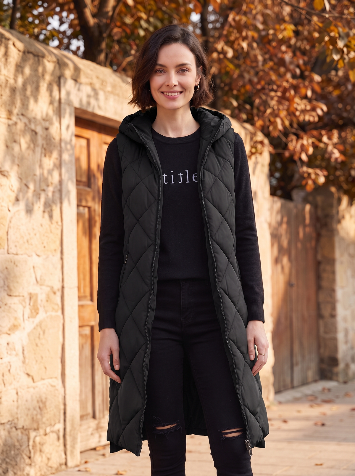 Women's long sleeveless padded jacket