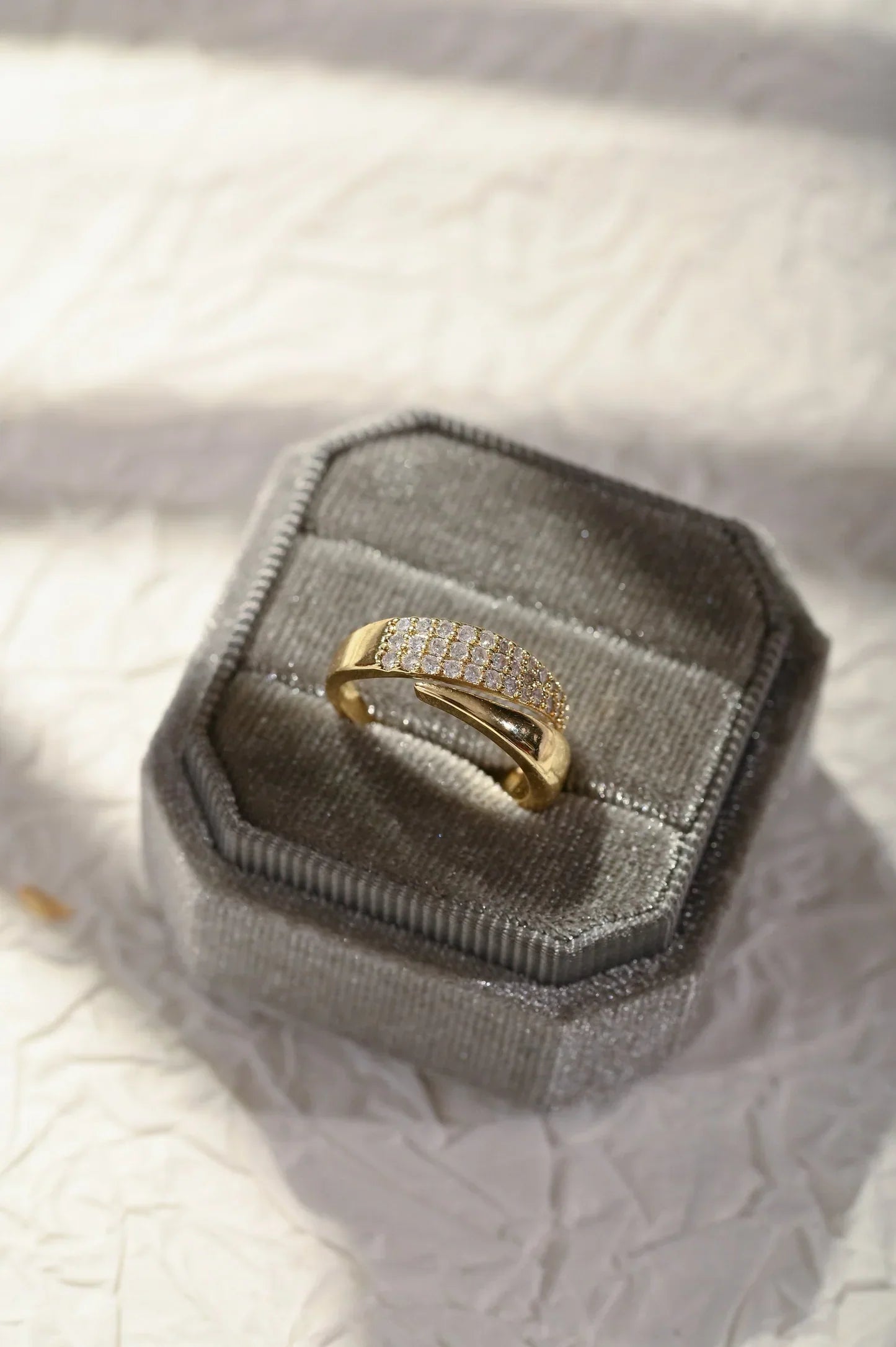 Adjustable band ring showing flexible fit detail