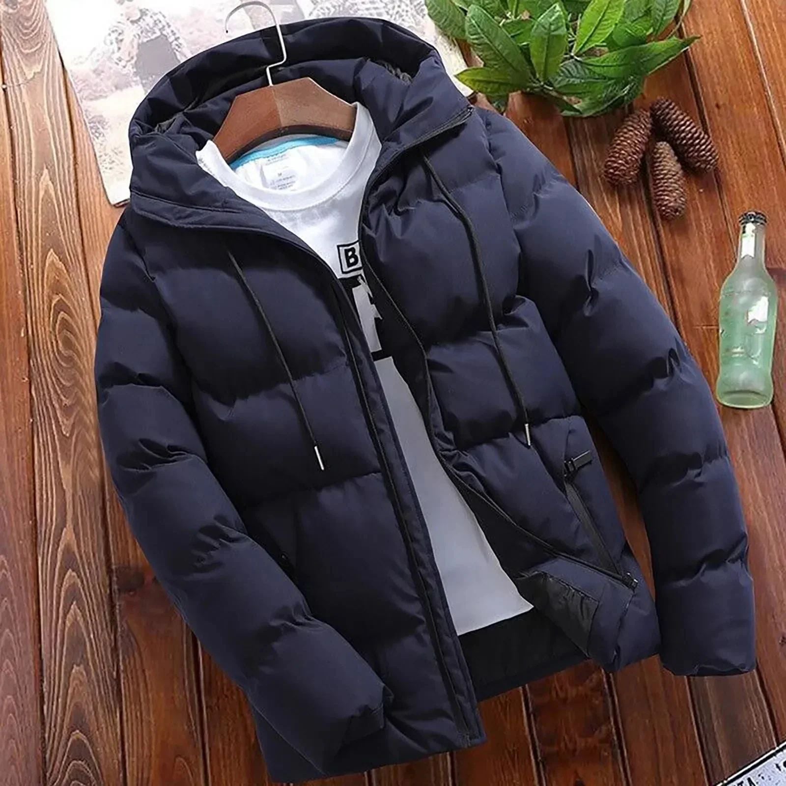 Insulated outerwear with functional pocket details and adjustable features for men