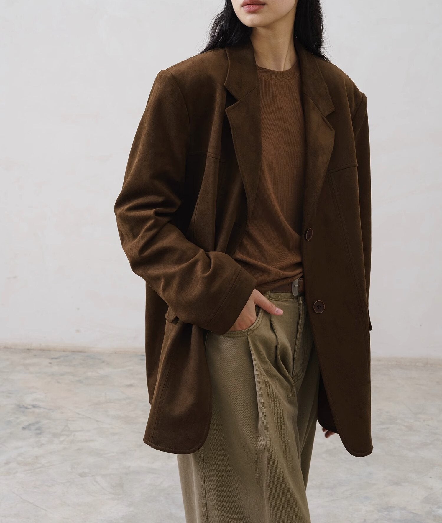 regular fit blazer showing side seam detail and sleeve construction
