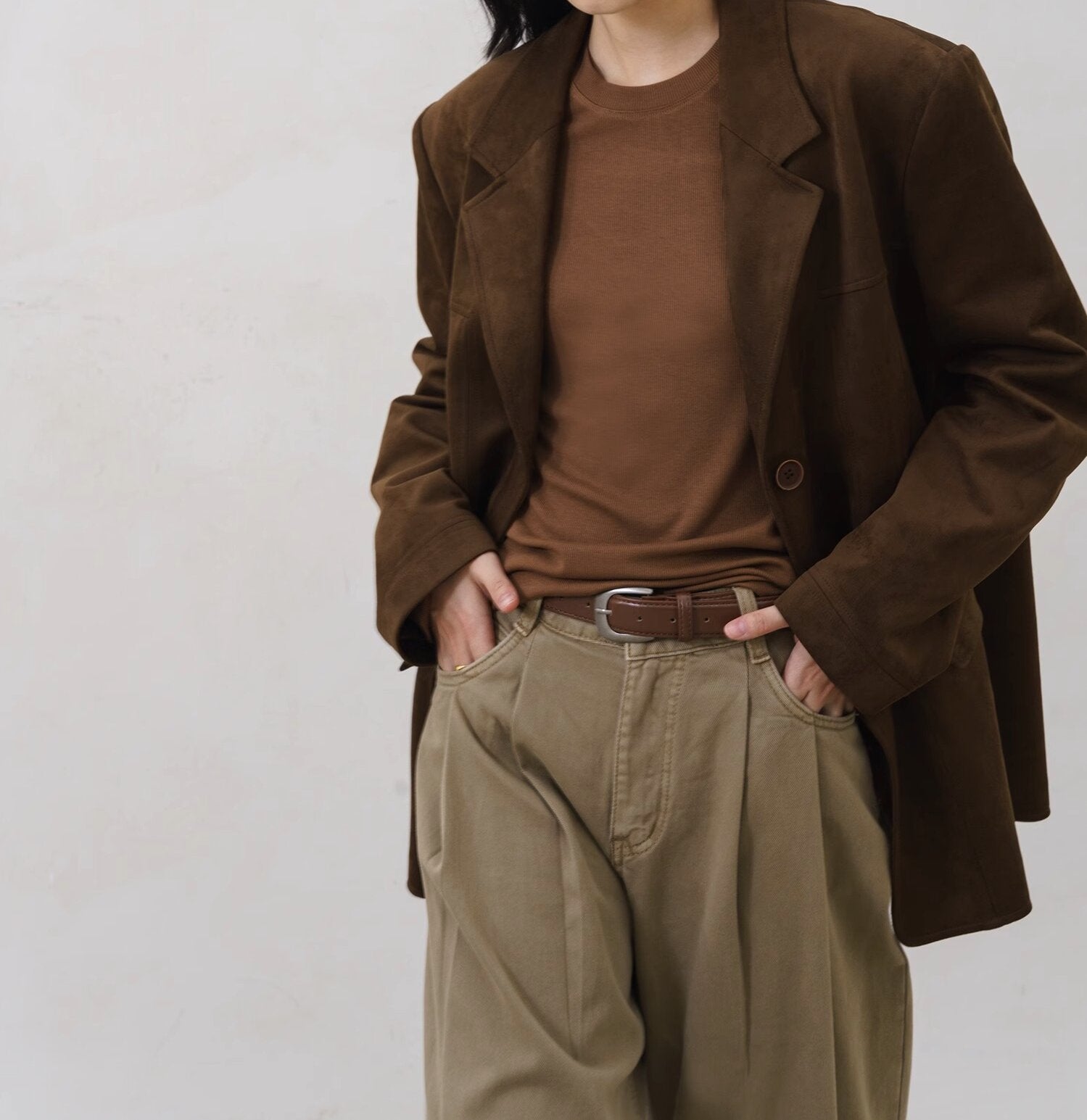 wool blazer back view showing center vent and shoulder fit
