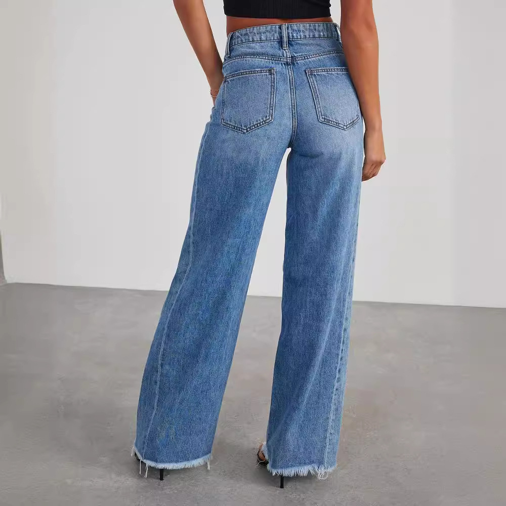 high waisted wide leg denim jeans displayed on model standing straight