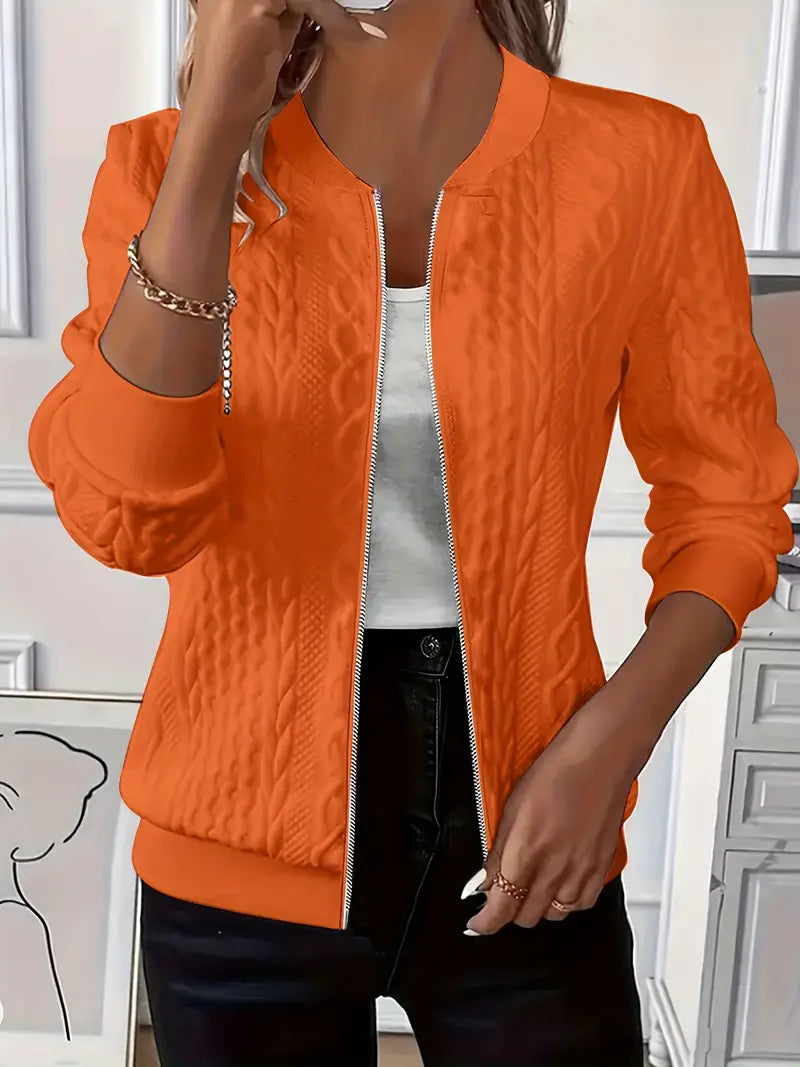 Cable-knit cardigan showing drape and silhouette