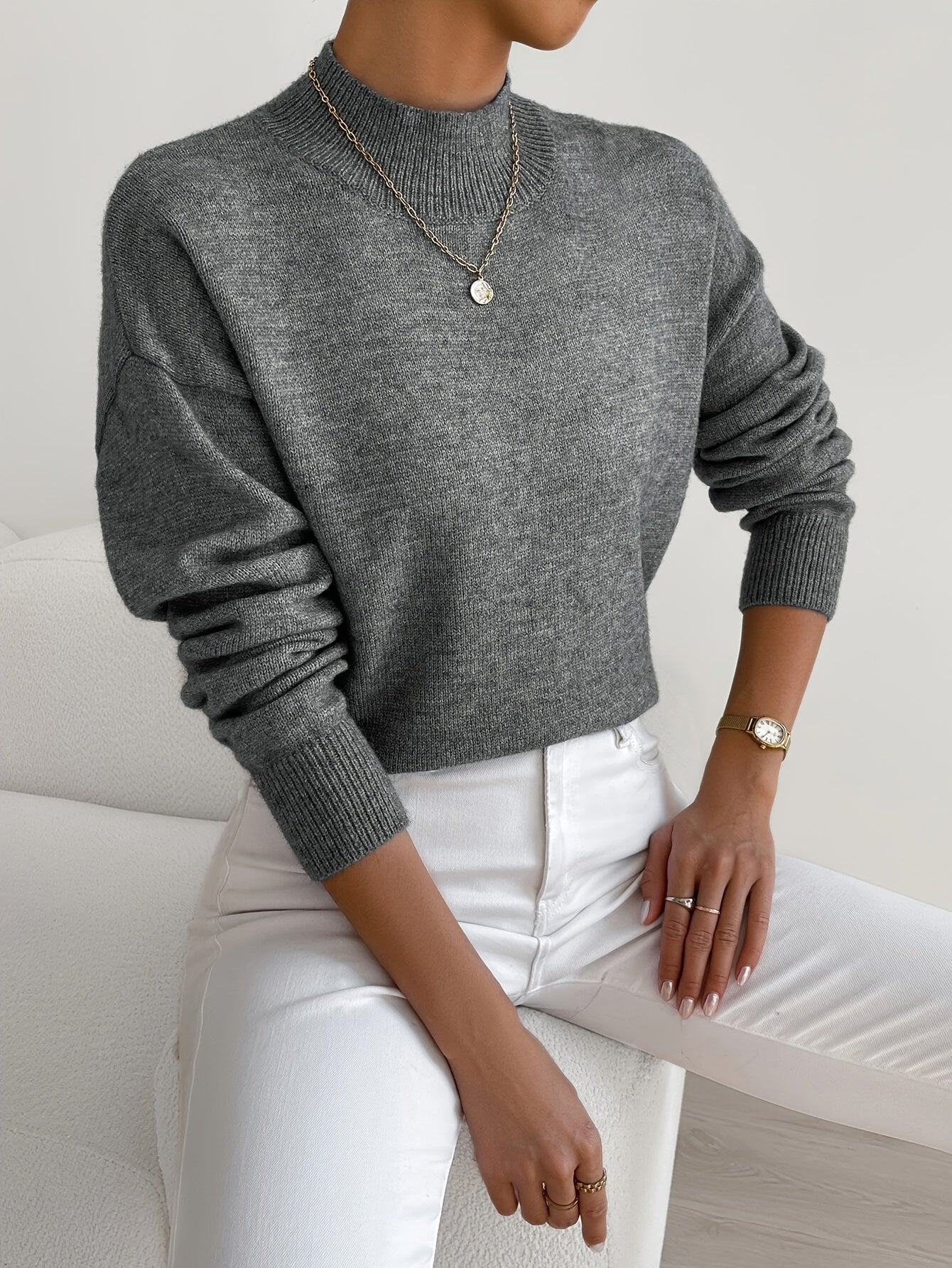 Wool sweater featuring ribbed detailing straight silhouette for casual occasions
