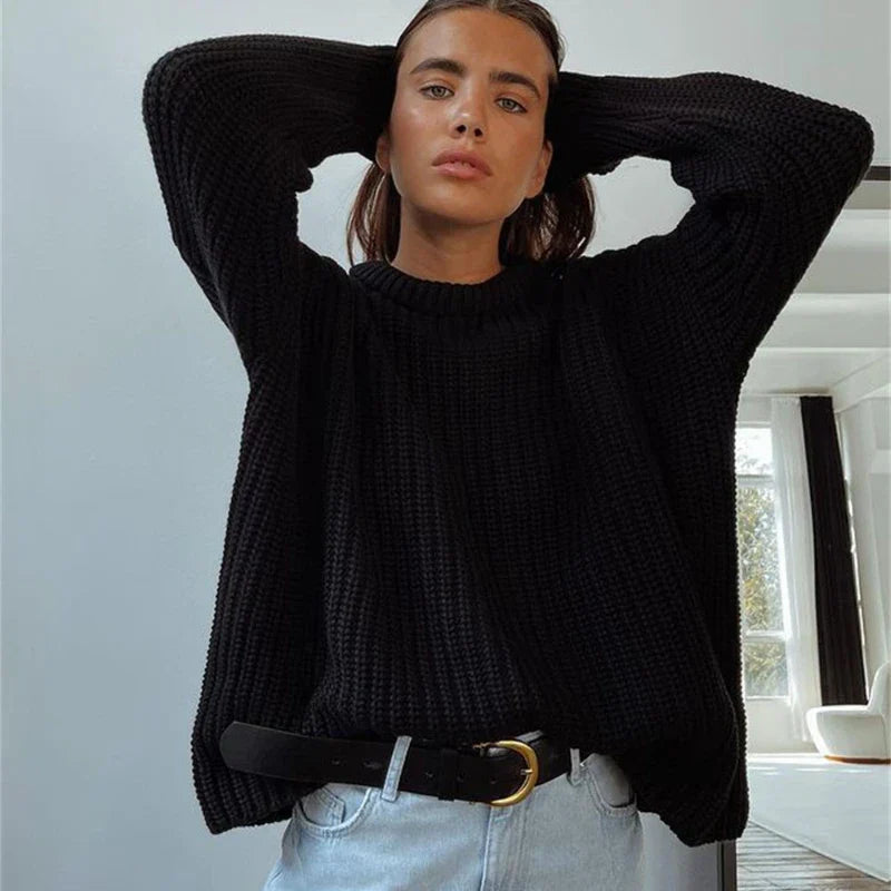 Ribbed knit fabric with chunky cable stitch detail and soft texture
