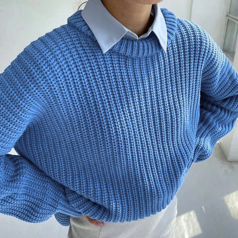 Detailed view of chunky knit weave with raised cable pattern
