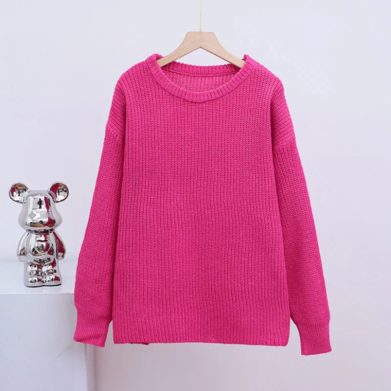 Chunky cable knit sweater back view with relaxed dropped shoulder seams
