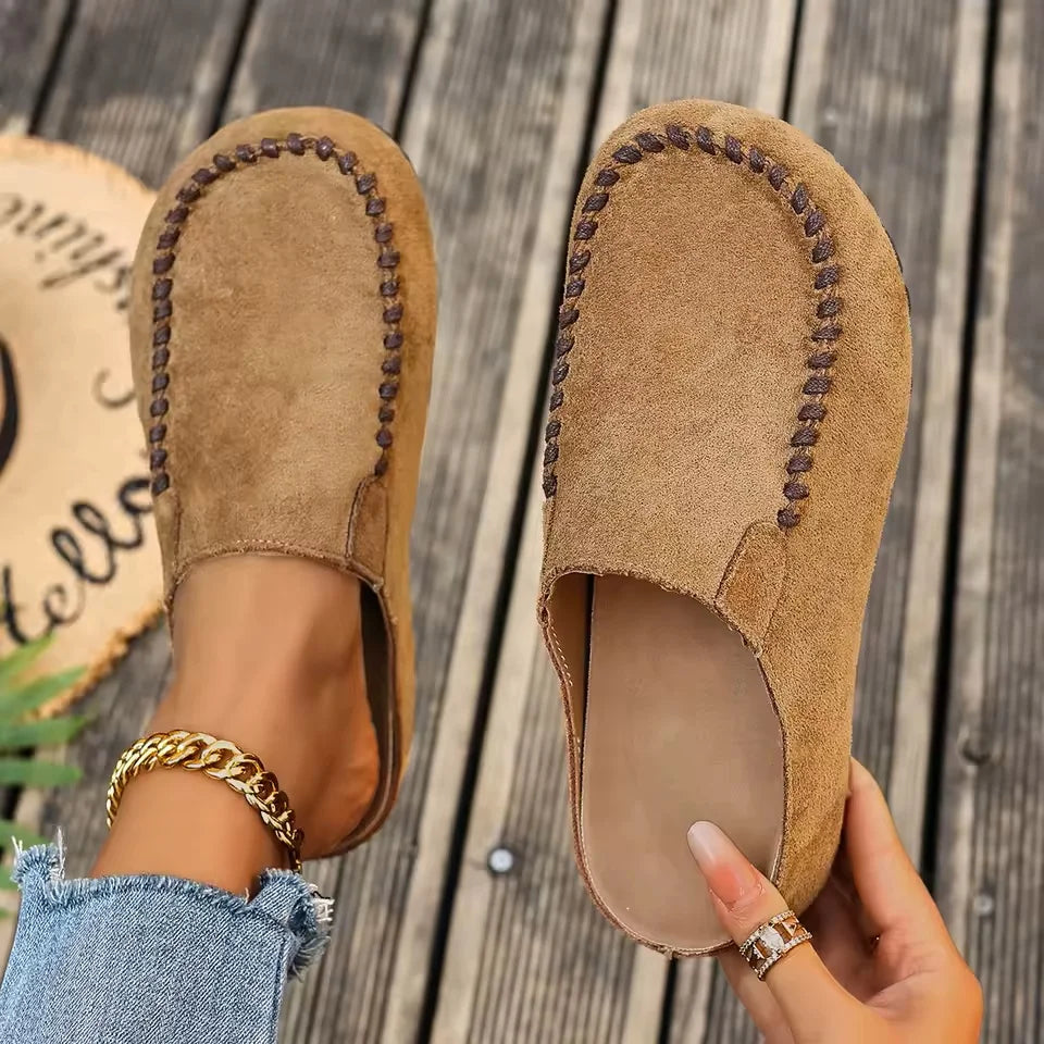 Women's brown slip-on mules with cushioned footbed and open-back vintage style