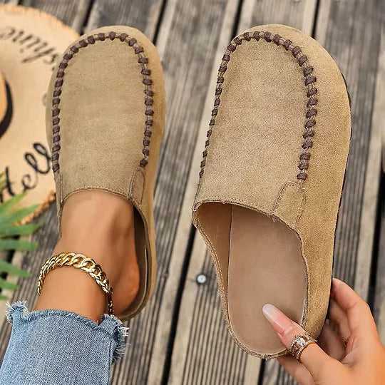 Women's beige open-back mules with cushioned insole and casual everyday styling