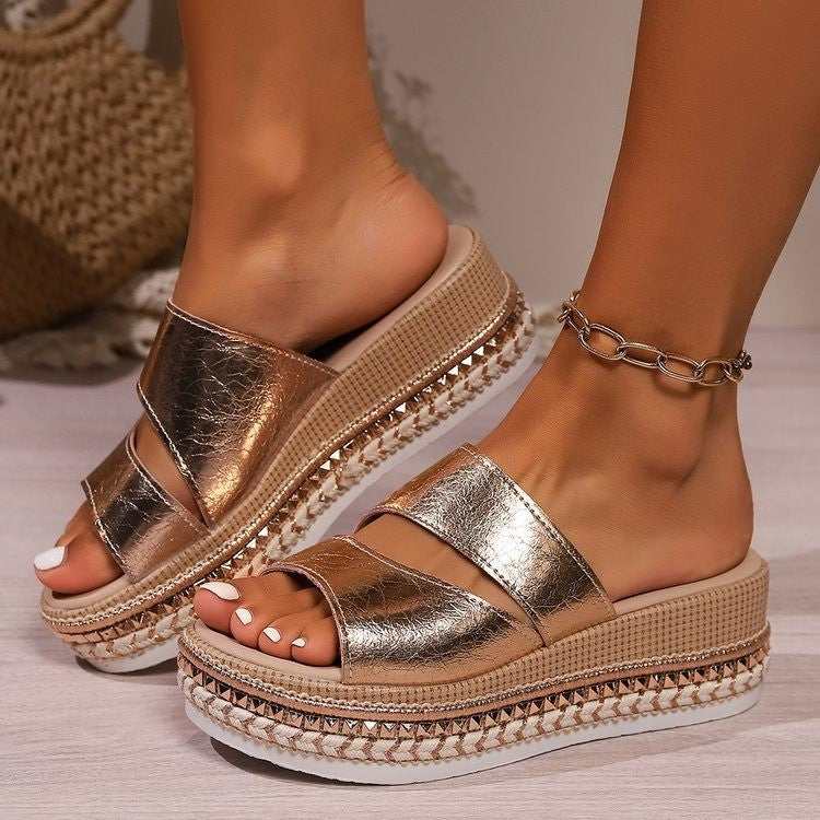 Women's platform sandals with cross straps and open-toe mule design in neutral tone, front view