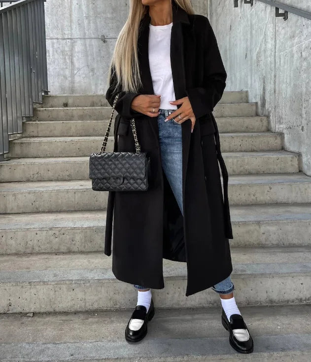 structured coat with full length hem and fitted waist detail