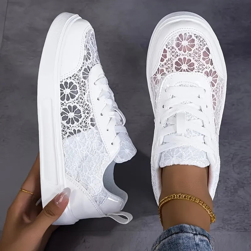 Women's lace-up mesh sneakers in white, front-facing hero shot, casual everyday style