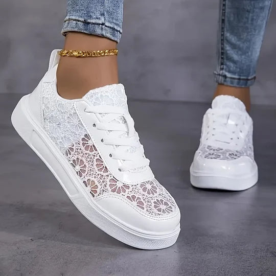 Women's casual mesh sneakers in white, pair view showing lace-up detail and low-top profile