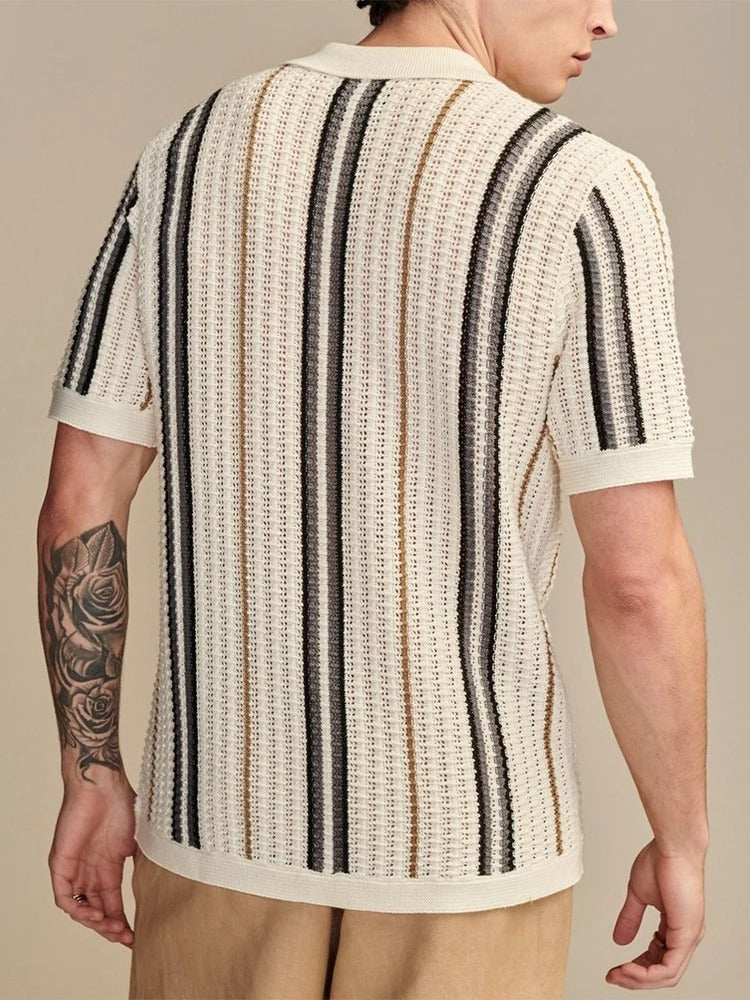 Men's beige polo shirt showing contrast panel detail and short sleeves – side or angled view