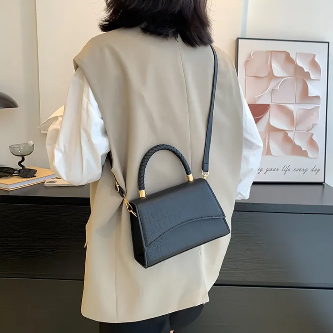 Vegan leather bag with metal hardware and crossbody strap for women
