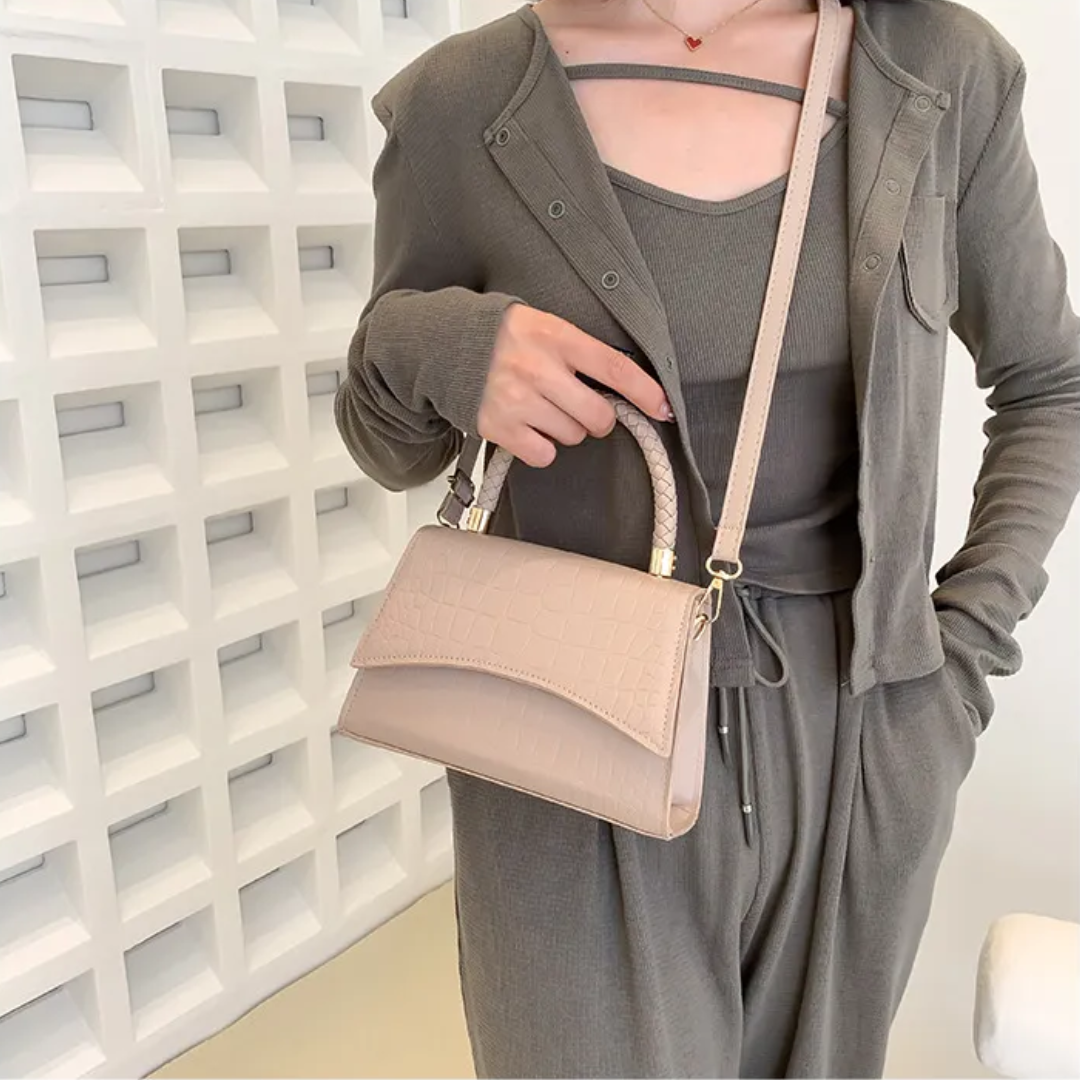 Faux leather structured bag with compartment detail and shoulder strap
