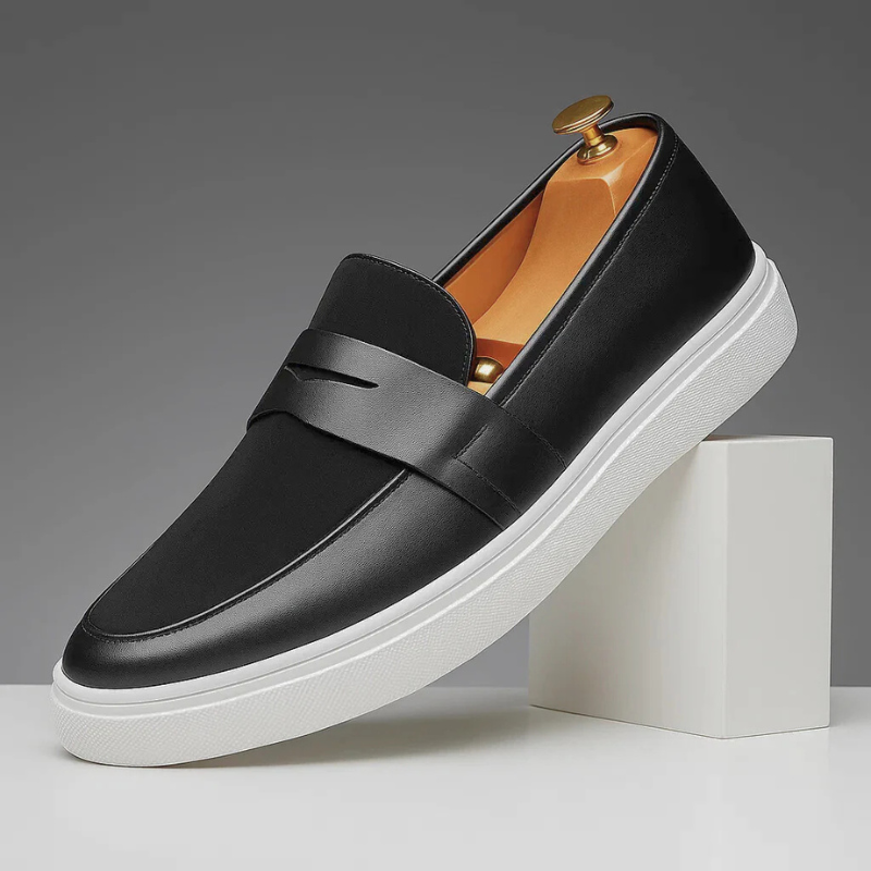 Men's slip-on loafers shown from the front, highlighting the penny strap detail — Montelu